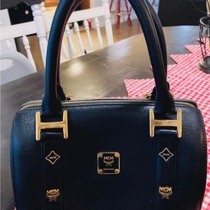 Like new mcm bag no scuffs or scratches like new leather bag